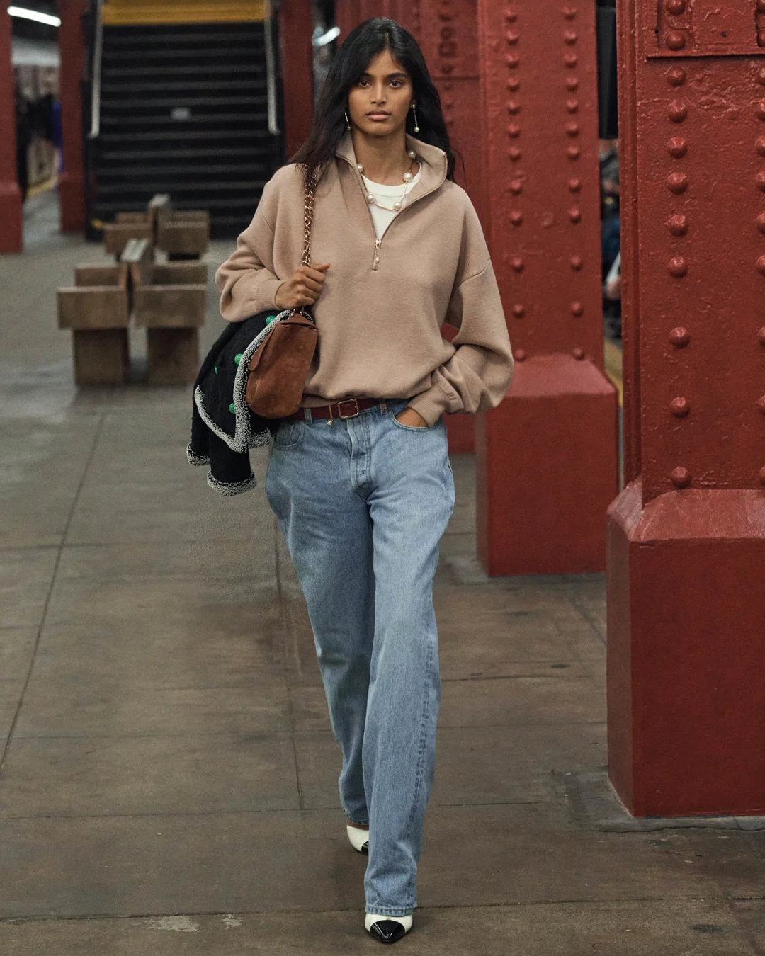 Bhavitha Mandava on a Brooklyn subway platform where she was first discovered by Showin Bishop of 28Models